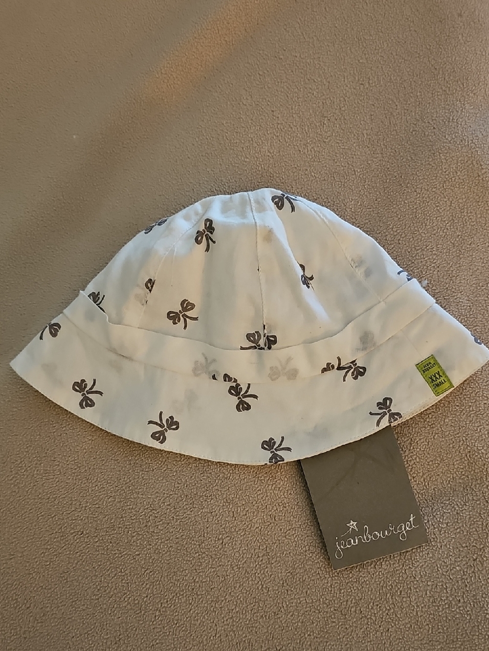 Jean Bourget Cream Bucket Hat with Brown Bow Print